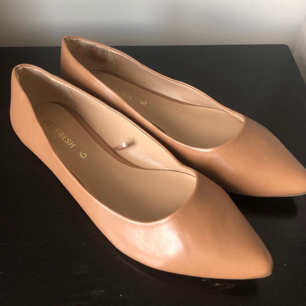 Tan flat shoes